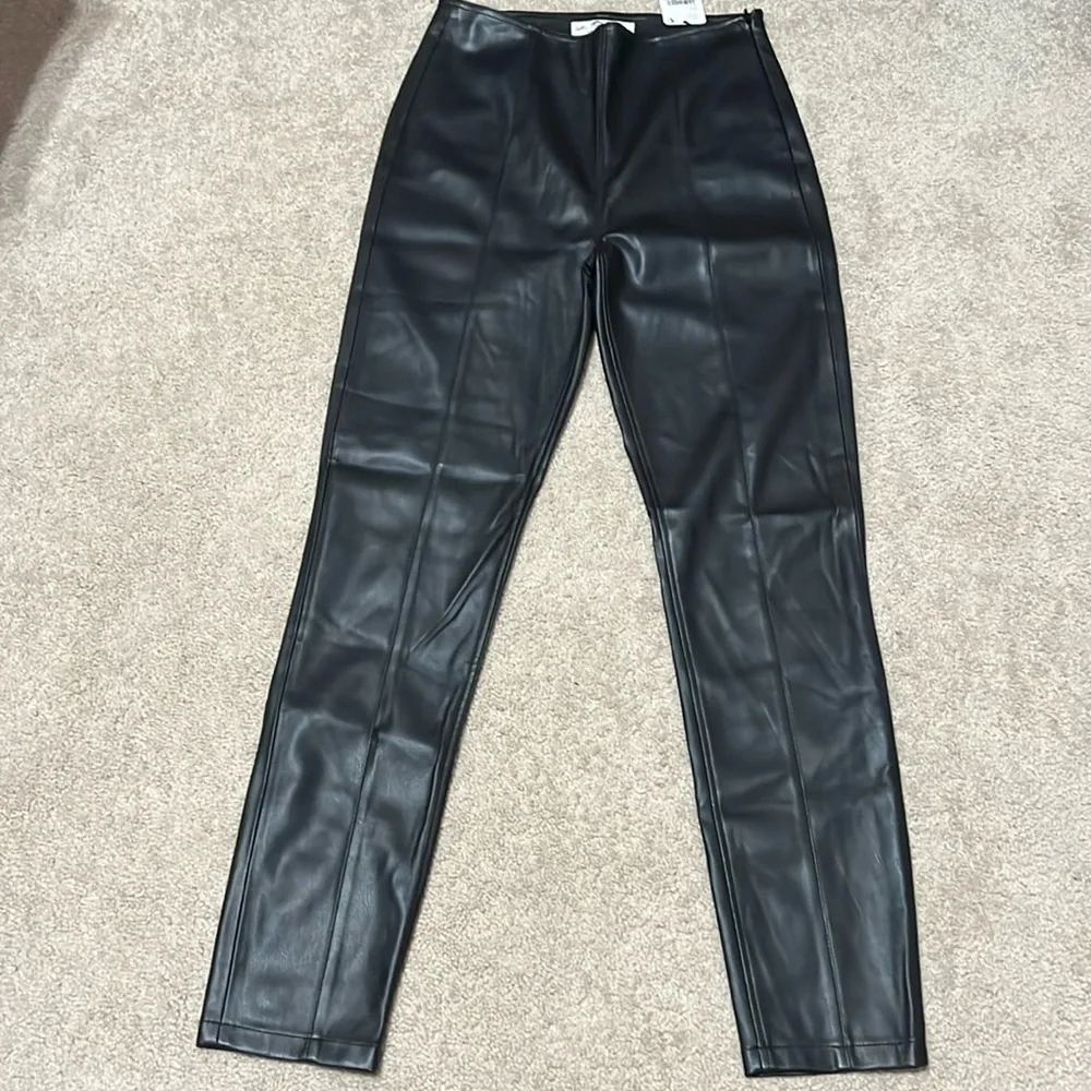 NWT FREE PEOPLE black coated pants Size 27